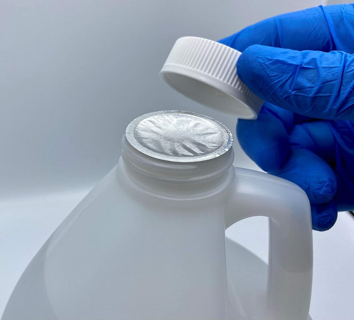4 Gallons USP Grade Isopropyl Alcohol 70% with Four 2 OZ Spray Bottles H31028